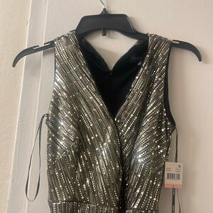 Jumpsuit sequin black & silver perfect for a party sleeveless